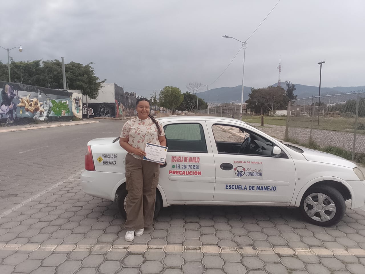 Alumno graduado de El Arte de Conducir 6